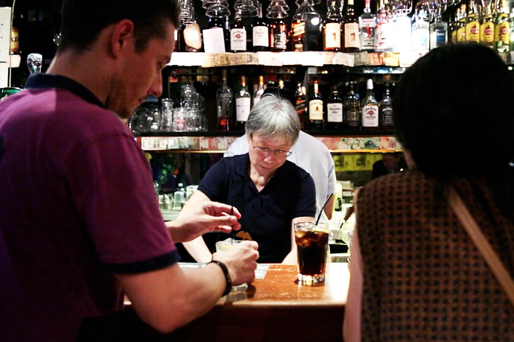 Grace Ma behind the bar at Club 71