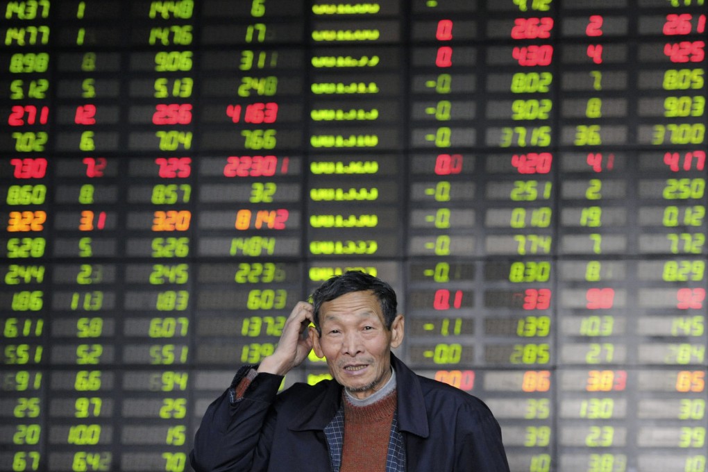A Chinese investor ponders his choices in Jiangsu province. China's Third Board market is a nursery for start-ups that are cash-starved in the country's financial markets. Photo: Reuters