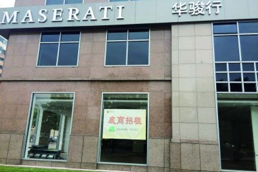 The closed dealership in Beijing. Photo: Mirror Evening News