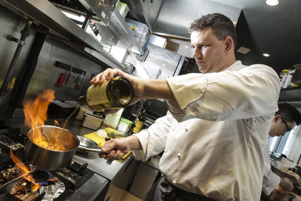 Philippe Orrico adds vin jaune to a sauce. Photos: Dickson Lee
