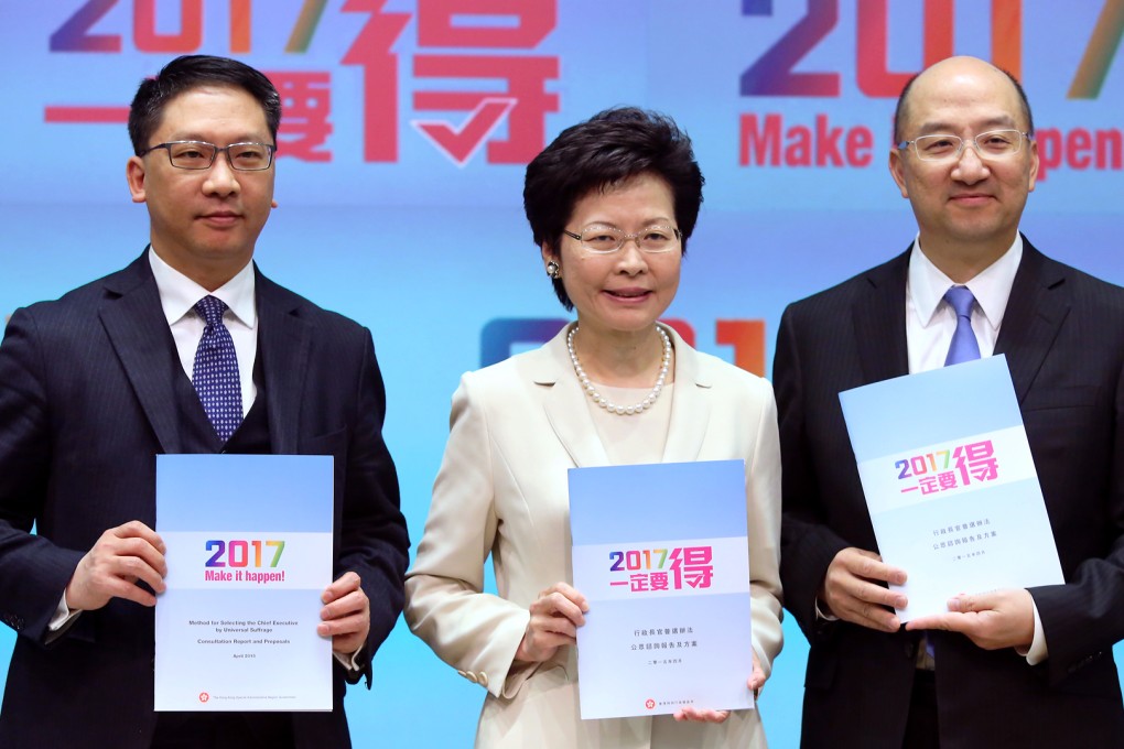 Carrie Lam, accompanied by Rimsky Yuen (left) and Raymond Tam, promotes the political reform package. Photo: Sam Tsang