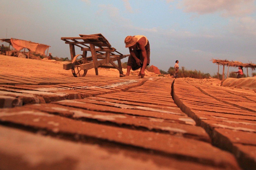 Labourers work at a brick factory in Myanmar. Photo: AFP