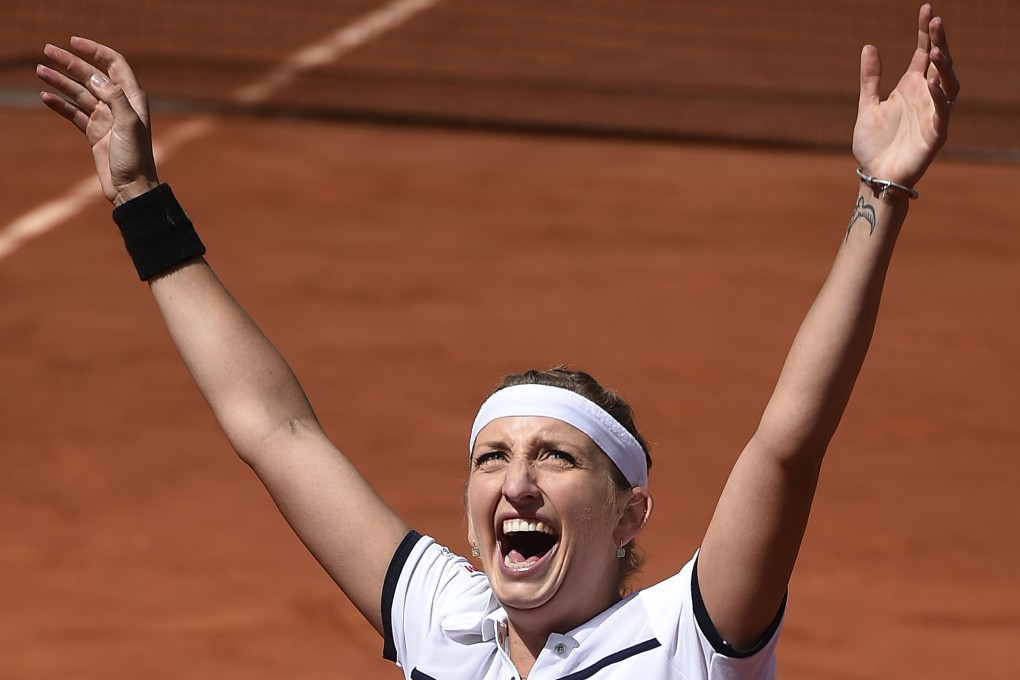 Switzerland's Timea Bacsinszky celebrates her victory over  Belgium's Alison Van Uytvanck in the quarter-finals. Photo: AFP