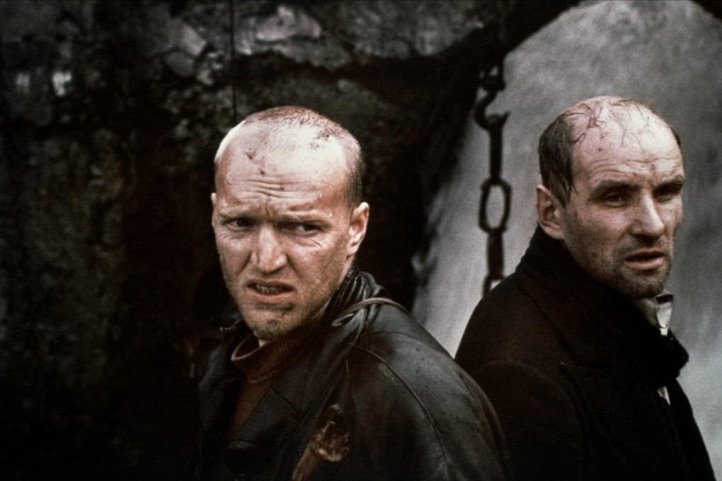 For those living behind the Iron Curtain, the subtext of Andrei Tarkovsky's film was almost all too obvious. Monochromatic images of ruined urban areas outside the fence, and lush green landscapes within. An emaciated, religious convict leads two godless intellectuals to a place that answered all their questions.