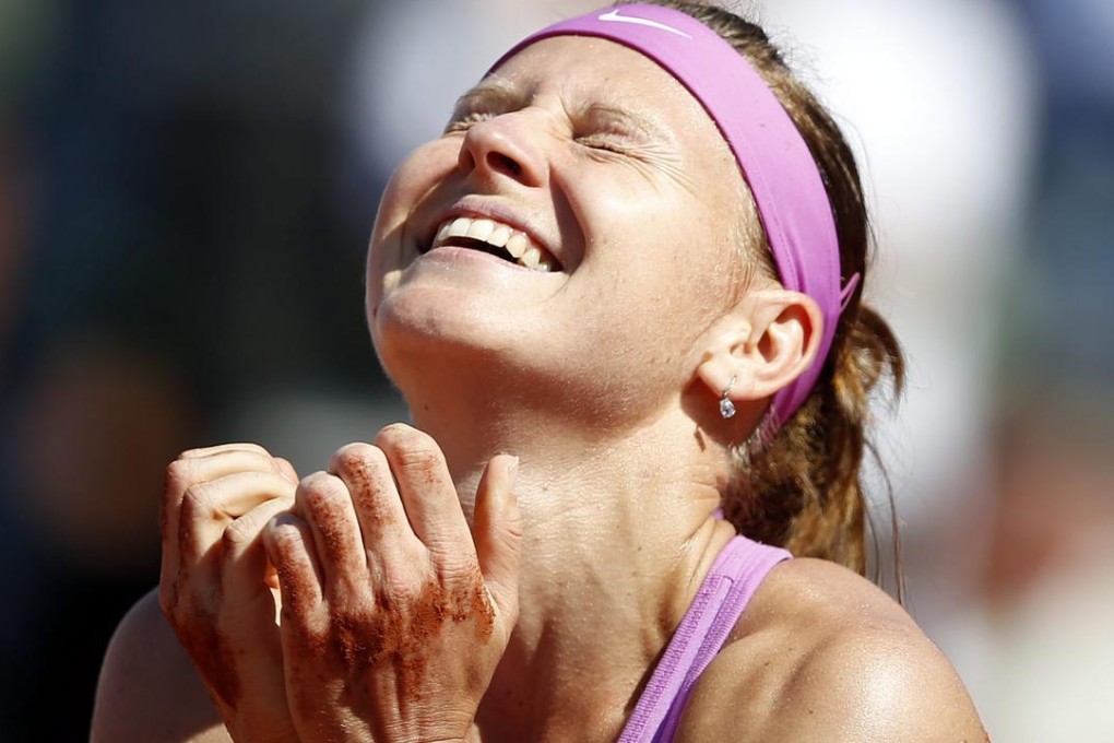 A jubilant Lucie Safarova reacts after winning her semi-final against Ana Ivanovic of Serbia 7-6, 7-5. Photos: EPA