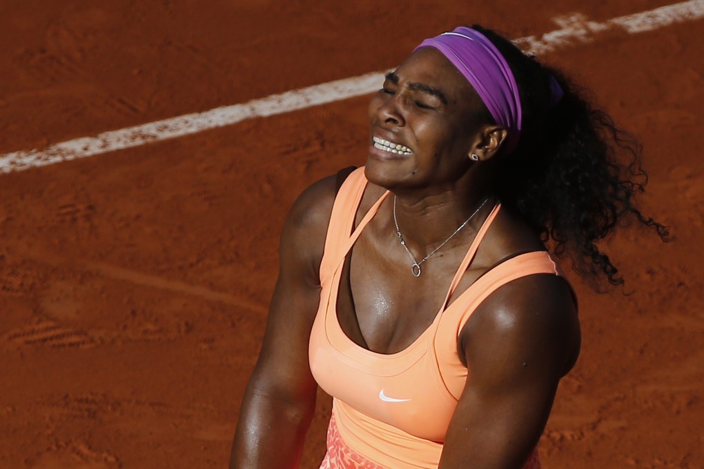 Serena Williams feels the pain in her semi-final against Timea Bacsinszky. Photo: EPA