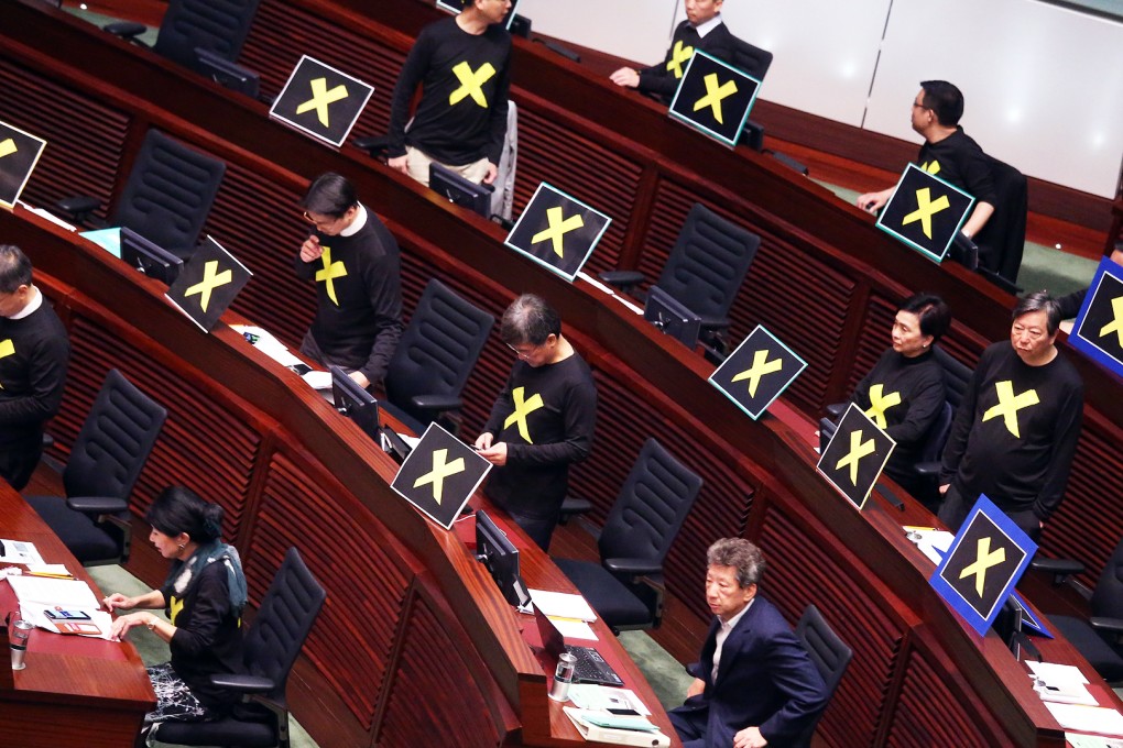 Pan-democrats leave the Legco chamber while Chief Secretary Carrie Lam Cheng Yuet-ngor gives her speech of political reform proposals in Tamar on April 22, 2015. Photo: K.Y. Cheng