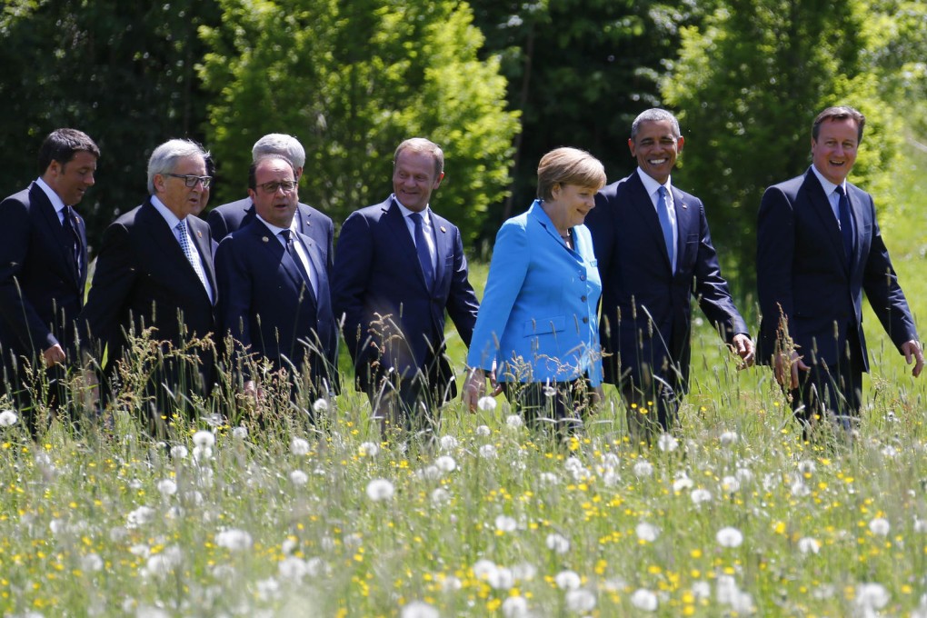 From left: Matteo Renzi, Jean Claude Juncker, Francois Hollande, Donald Tusk, Angela Merkel, Barack Obama and David Cameron. Photo: AP