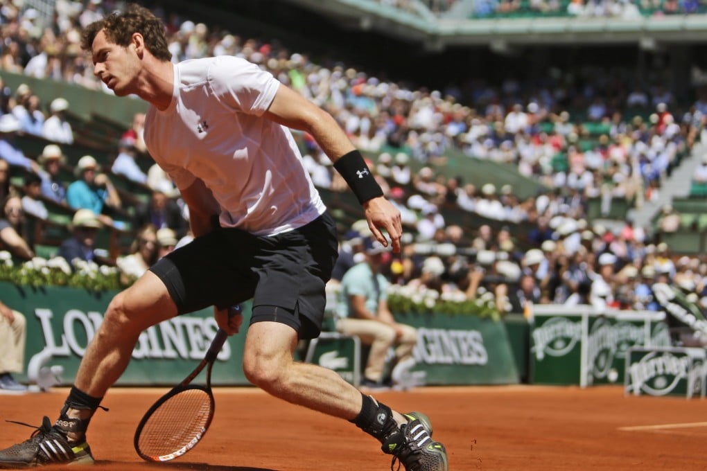 Britain's Andy Murray misses a return in his semi-final match against Novak Djokovic. The Scot was beaten in five sets. Photo: AP