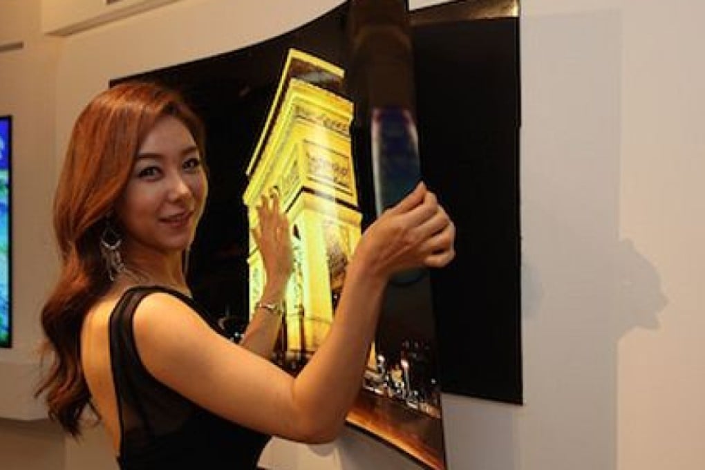 LG unveils ‘wallpaper TV’ at a press event in Korea last month, it is less than 1mm thick and can be peeled off the wall.
