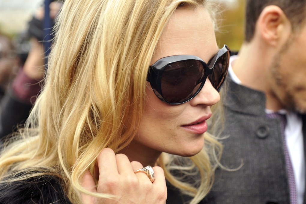 Kate Moss, 41, was reportedly escorted off a plane from Turkey that landed at London's Luton airport on Sunday. Photo: AFP