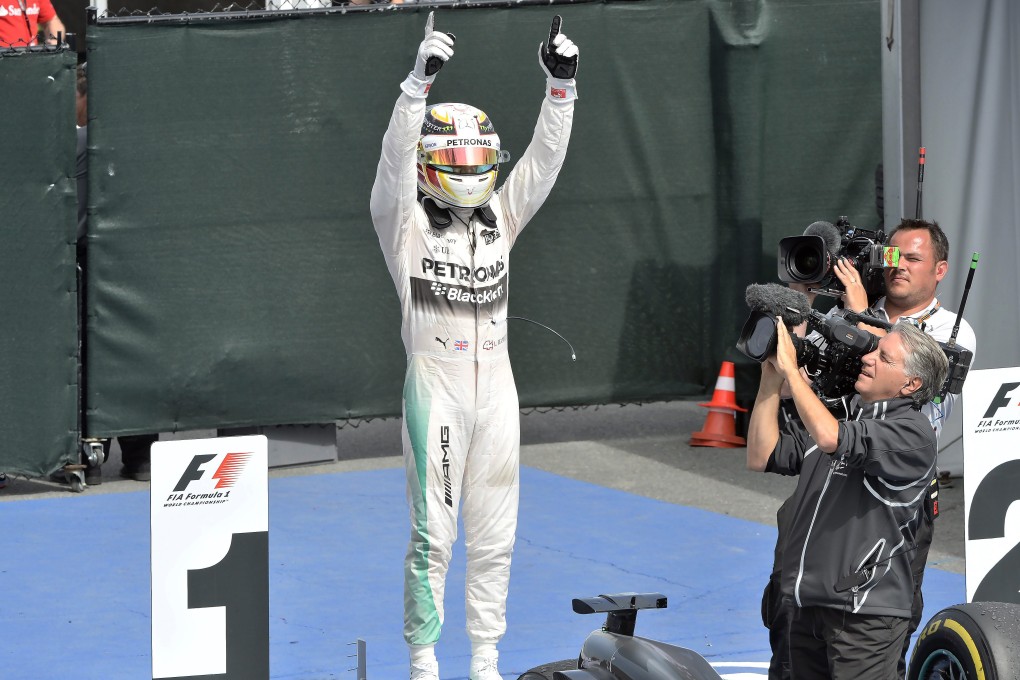 Lewis Hamilton celebrates after winning the Canadian Grand Prix in Montreal. Photo: AP