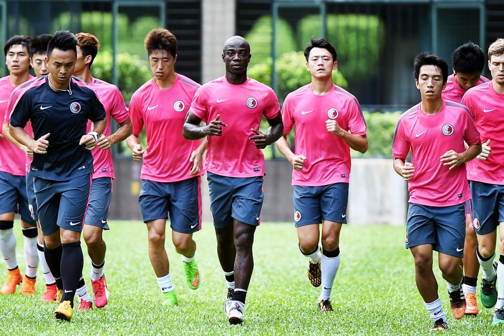 Hong Kong's 'diverse' squad of 'black skin, yellow skin and white skin people' in training on Monday. Photo: Xinhua