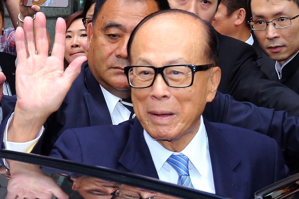Billionaire Li Ka-shing waves while about to get into his car. The tycoon's Power Assets Holdings has sold a 16.5 per cent stake in Hong Kong Electric Investments to Qatar's sovereign wealth fund. Photo: Handout
