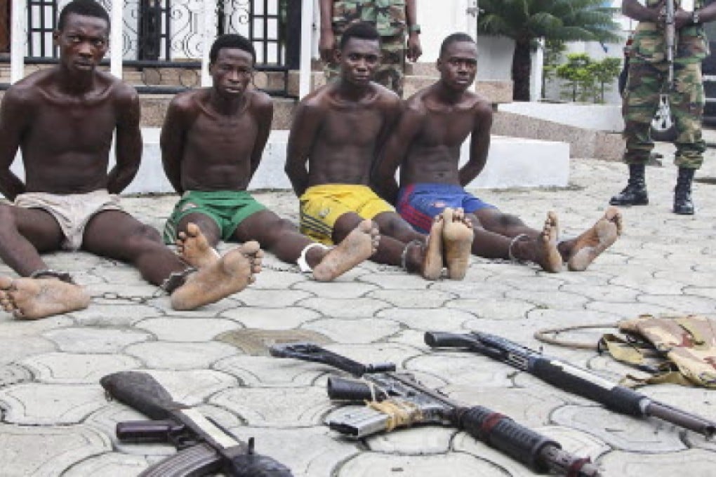 Pirates detained in the Niger Delta last month. Photo: EPA