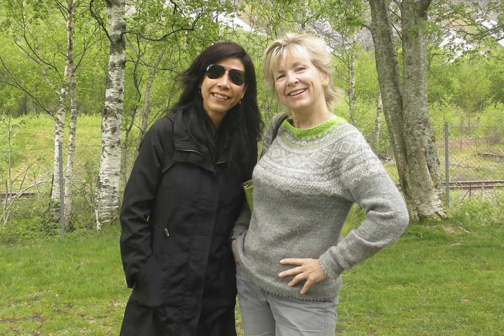 The writer with her Pui O "neighbour" Miss Chan at the Troll Wall, in Norway.