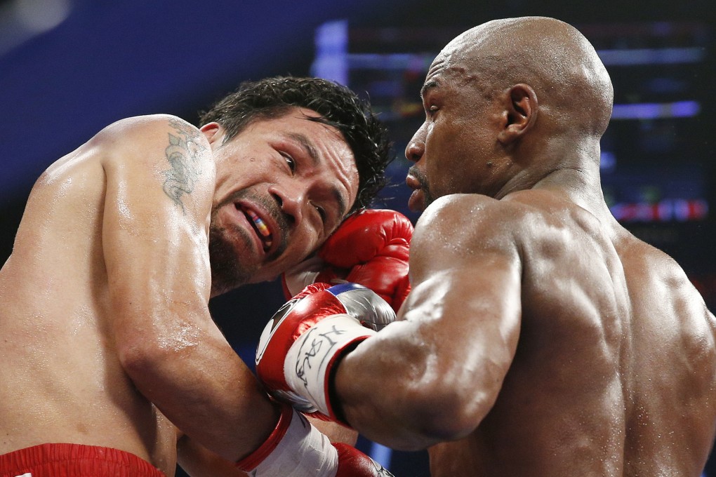 Floyd Mayweather earned US$300 million over the past 12 months, while Manny Pacquiao pocketed US$160 million. Photo: AP