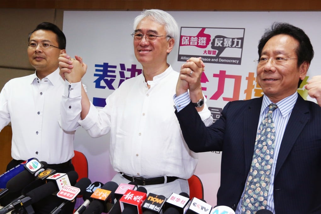 From left to right, Brave Chan Yung, Robert Chow Yung and Barry Chin Chi-yung hold press conference on its action to support and secure the Legco passage of constitutional reform package. Photo: Nora Tam