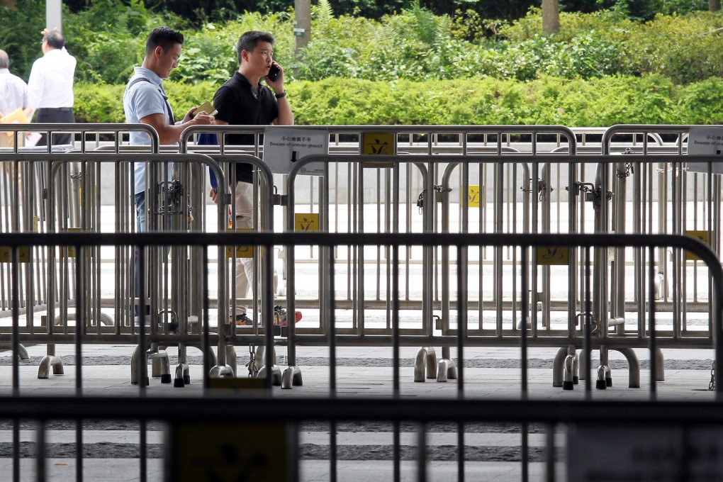 Fencing is set up outside government headquarters in Admiralty ahead of the vote on reform. Photo: Dickson Lee