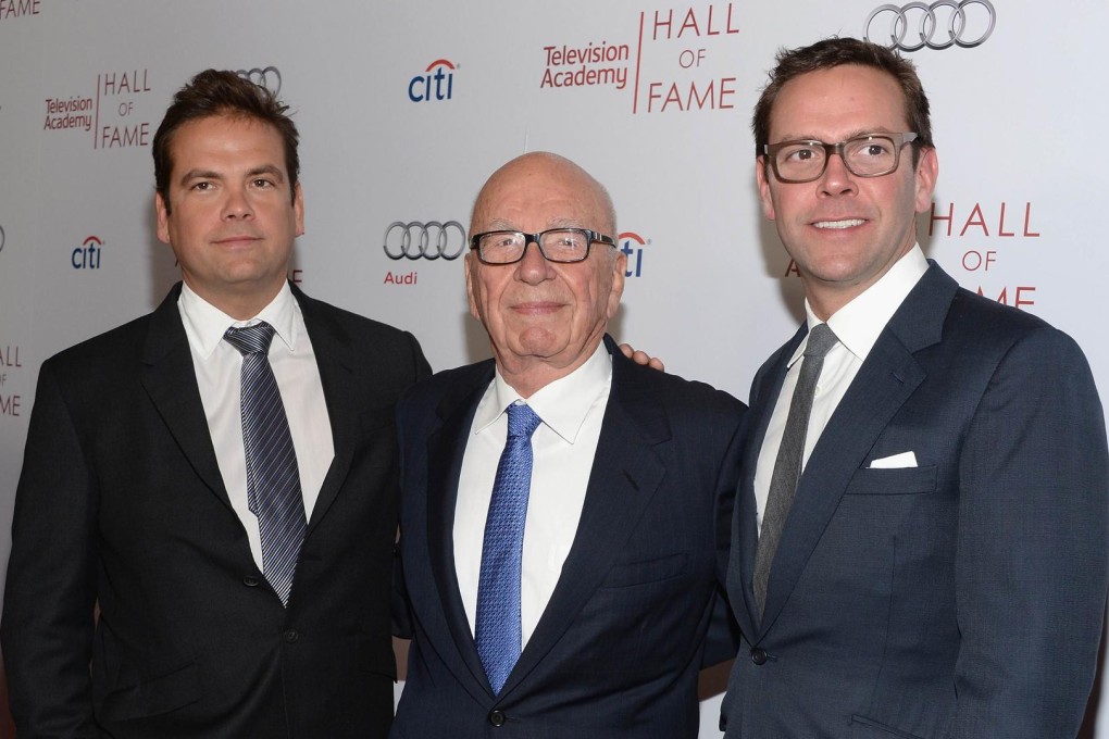 (L-R) Lachlan Murdoch with Rupert and brother James.Photo: AFP
