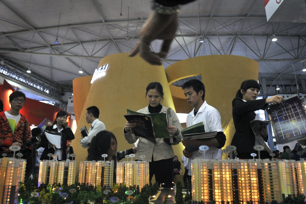 A real estate fair in Chengdu where Sunshine 100 China Holdings has some projects. Its shares were suspended from trading on Friday pending an announcement. Photo: AP