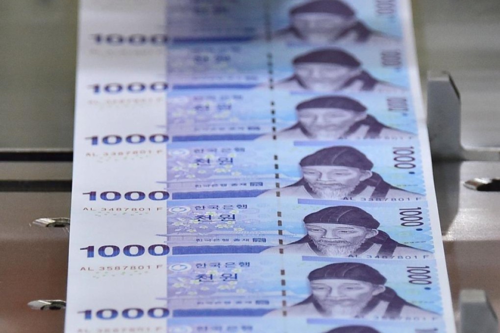 The Korean won slid 0.4 per cent this week against the US dollar. Photo: AFP