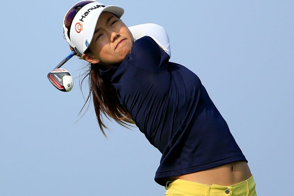 Jenny Shin plays her tee shot on the par three 16th hole. Photo: AFP