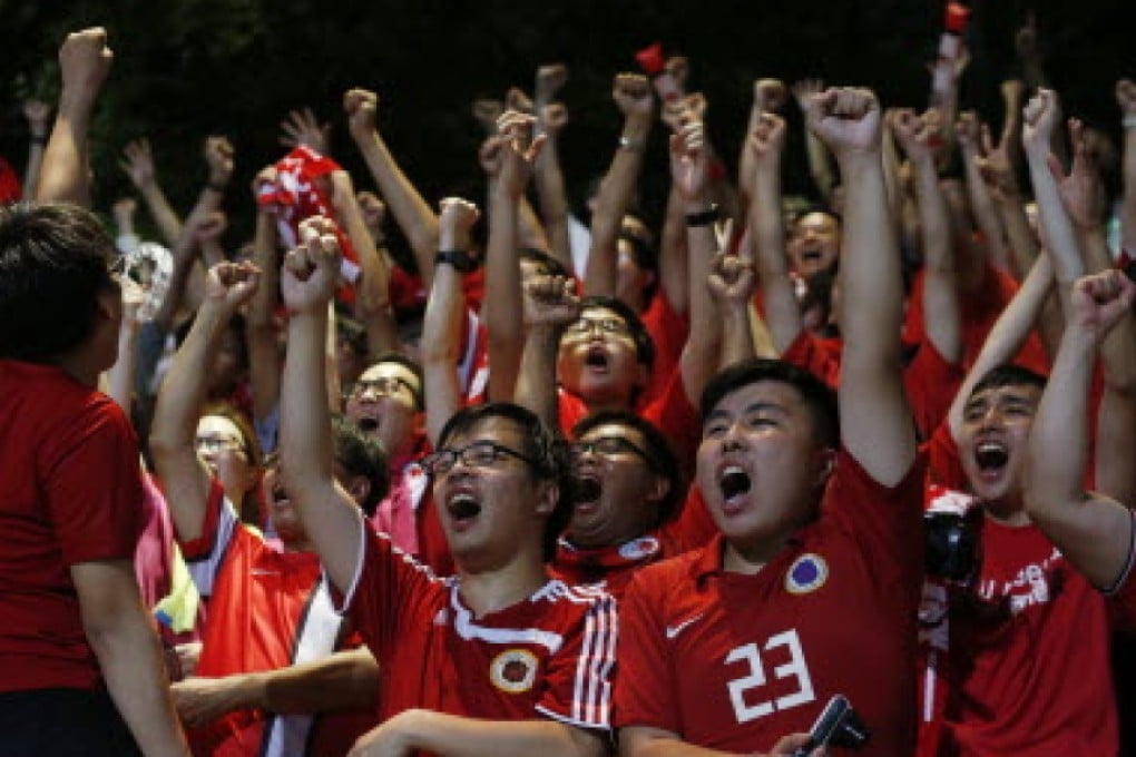 Hong Kong fans rally around the team during their World Cup clash against Bhutan. Photo: AP