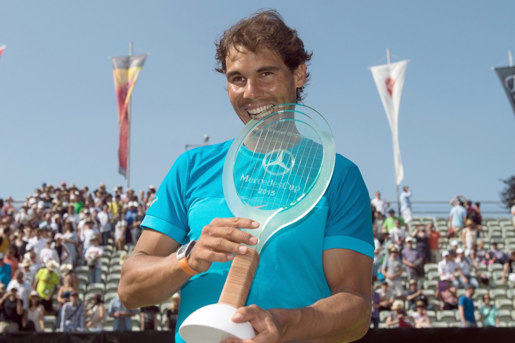 Rafael Nadal with his trophy after winning the Mercedes Cup final in Stuttgart. Photo: EPA