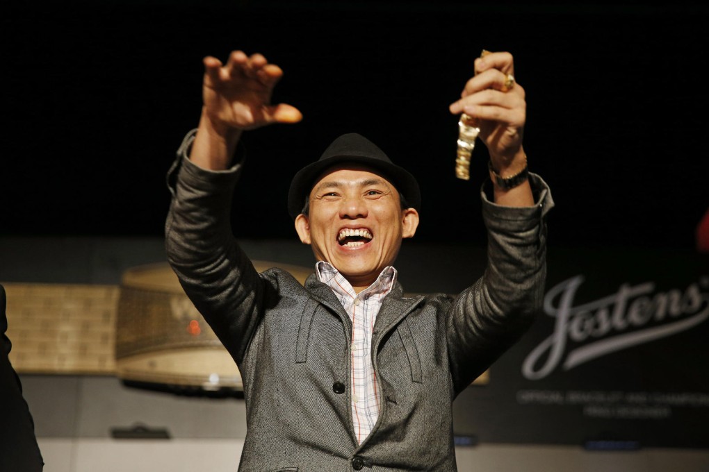 Christian Pham celebrates his unexpected poker win.Photo: AP