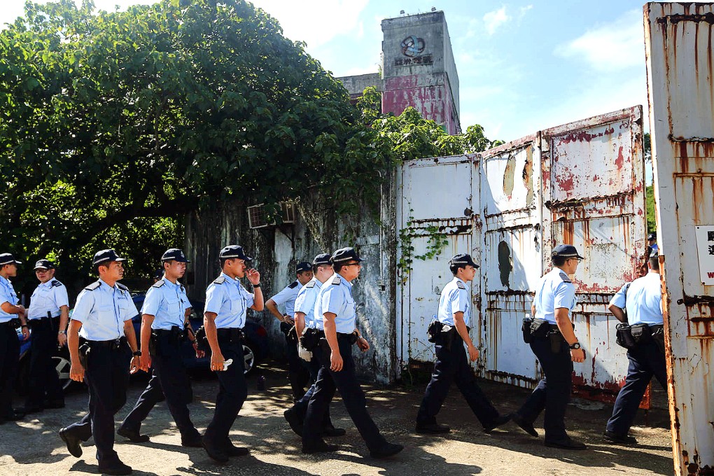 A large crowd of police investigate at the vacant former ATV studio in Sai Kung. Photo: Sam Tsang