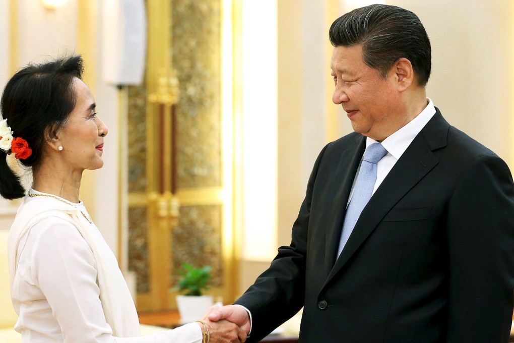 Chinese President Xi Jinping shakes hands with Myanmar pro-democracy leader Aung San Suu Kyi. Photo: Reuters