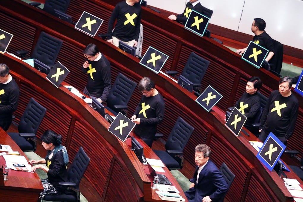 Pan-democrats leave the Legco chamber while Chief Secretary Carrie Lam Cheng Yuet-ngor gives her speech of political reform proposals in April. Photo: K.Y.Cheng