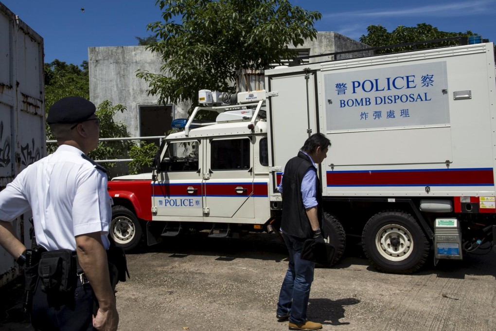 A police bomb disposal vehicle enters the former ATV studio where explosives were seized. Photo: Reuters