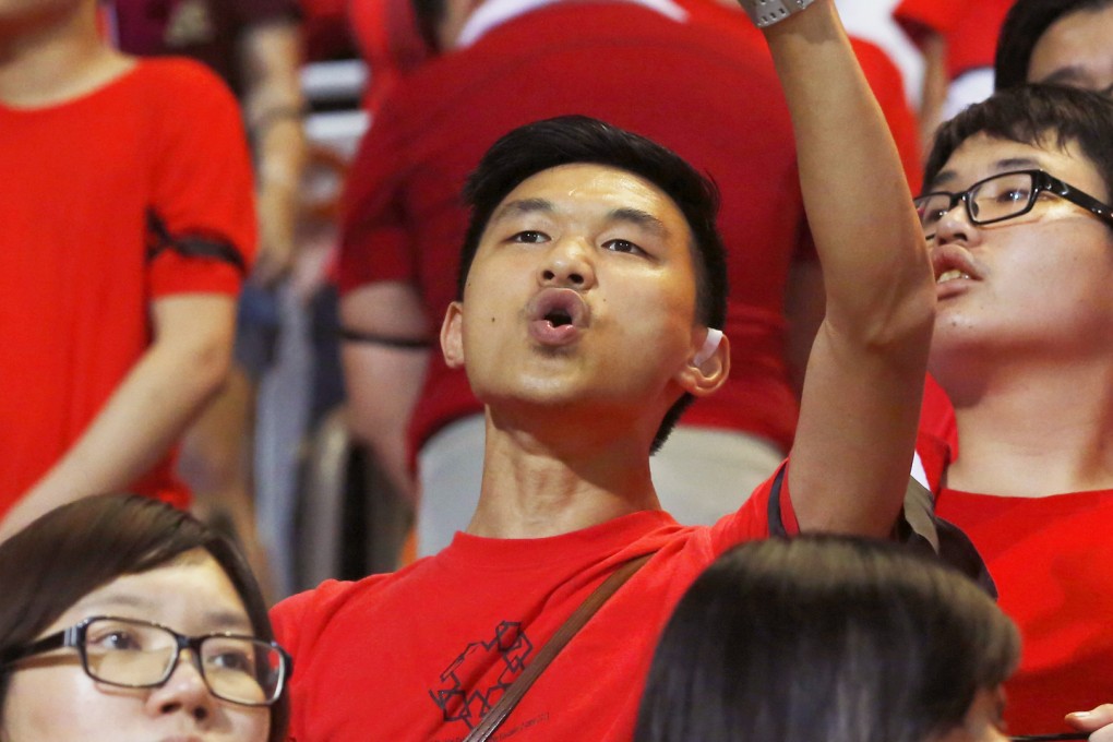 A Hong Kong fan boos during the national anthem before the World Cup qualifier against the Maldives at Mong Kok Stadium. Hong Kong won 2-0. Photo: AP