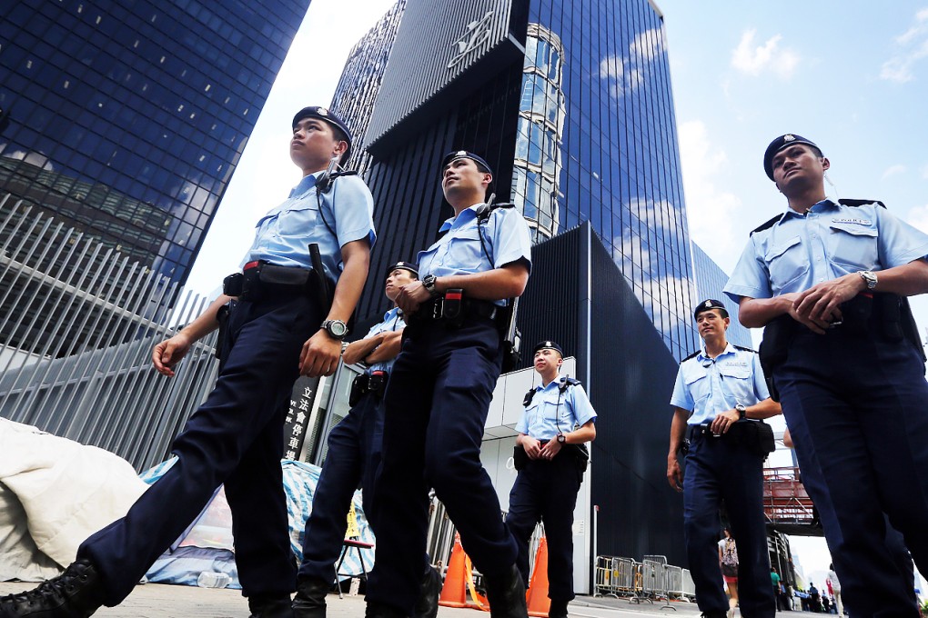 Members of the Police Tactical Unit patrol ahead of the vote. Photo: Sam Tsang