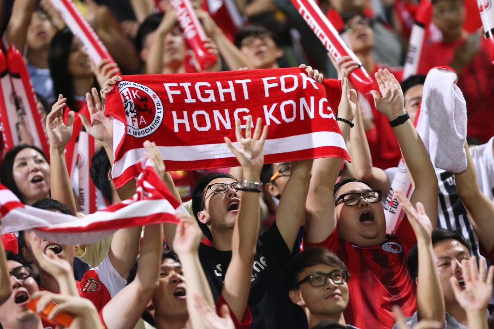 Hong Kong fans show their support at the World Cup qualifier against  the Maldives at Mong Kok Stadium on Tuesday. Photos: K.Y.Cheng