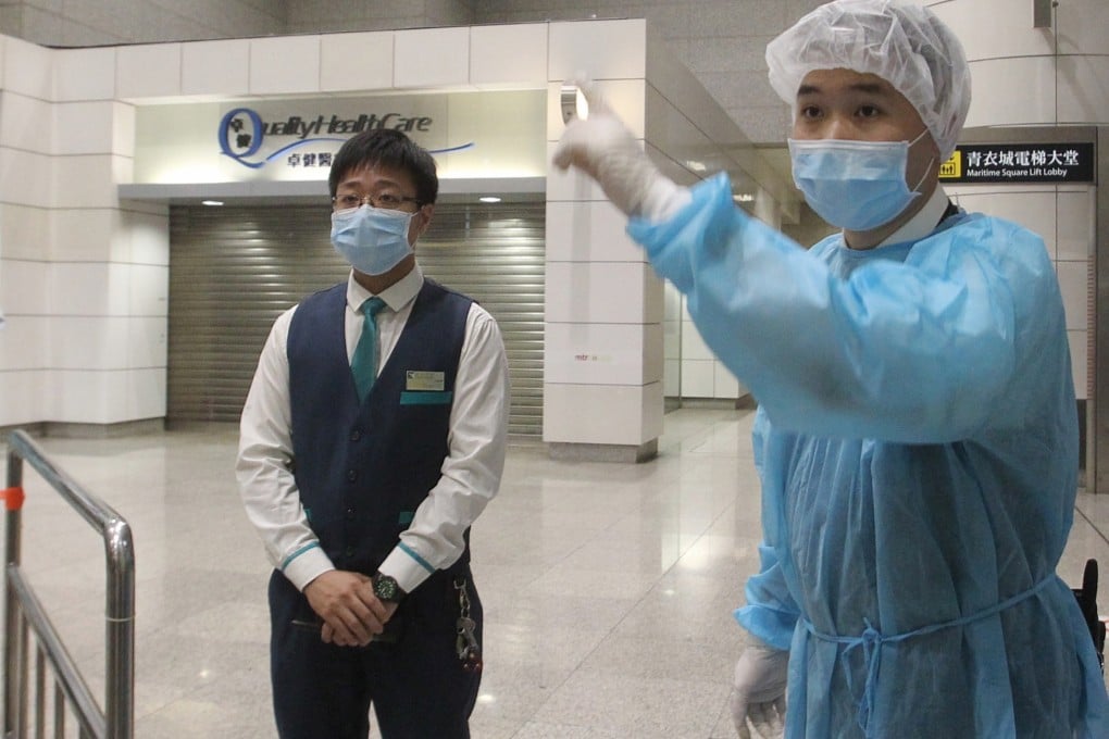 A hospital staff gestures at a private hospital in the New Territories district of Hong Kong as the region braces for the possible spread of the MERS virus. Photo: Xinhua