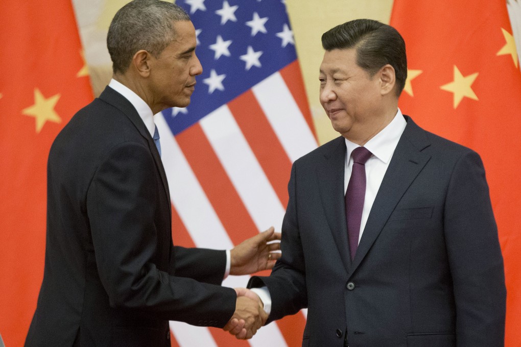 US President Barack Obama and Chinese President Xi Jinping at the conclusion of their joint news conference in Beijing last year. Photo: AP