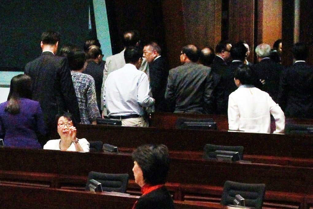 Some 31 pro-establishment lawmakers left the chamber before the vote. Photo: Felix Wong