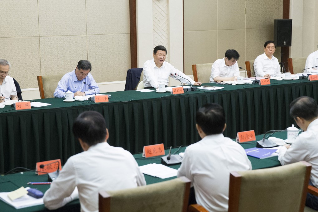 Chinese President Xi Jinping (rear, third from left) attends a Communist Party of China symposium on poverty relief and economic and social development in the 2016-2020 period in Guiyang, capital of southwest China's Guizhou Province. Photo: Xinhua