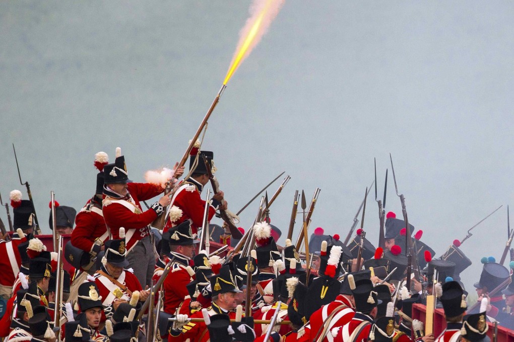 Performers re-enact a French attack at the bicentennial celebrations of the Battle of Waterloo.Photo: Reuters