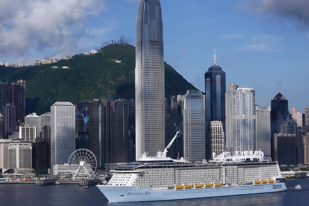The Peak and Central waterfront form a backdrop as the massive cruise liner Quantum of the Sea sails in yesterday. Photo: Jonathan Wong