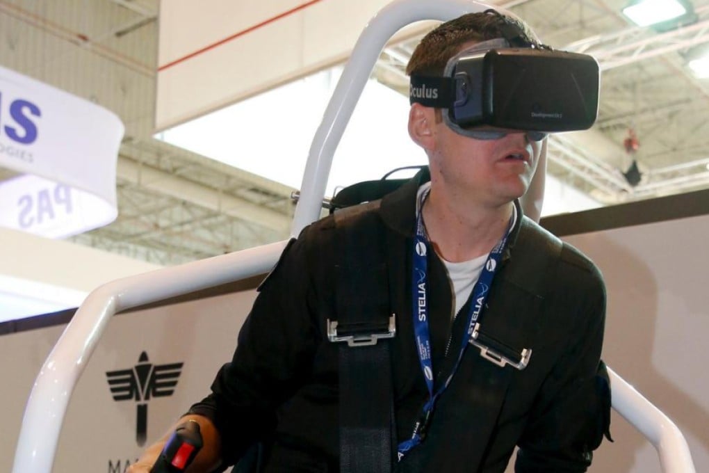 A test pilot demonstrates a jetpack simulator.Photo: Reuters