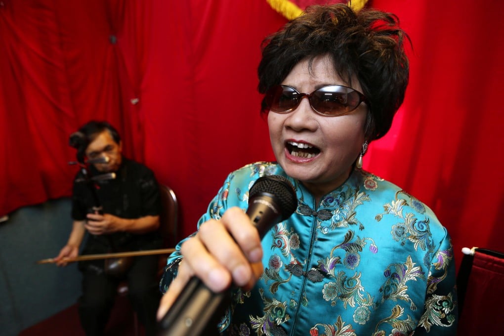 Tong Siu-yin, who went blind after contracting measles, rehearses in To Kwa Wan. Photo: Nora Tam