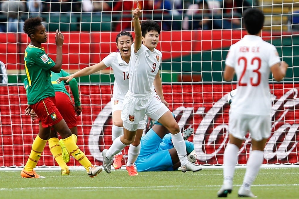 China's Wang Shanshan celebrates her winning goal against Cameroon at the Commonwealth Stadium in Edmonton. Photo: Xinhua