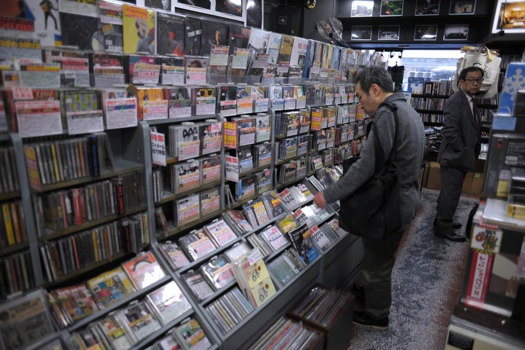 Japanese consumers have been slow to adopt streaming and download services. Packaged sales, such as CDs, accounted for 78 per cent of the nation's music market revenue last year. Photo: AFP