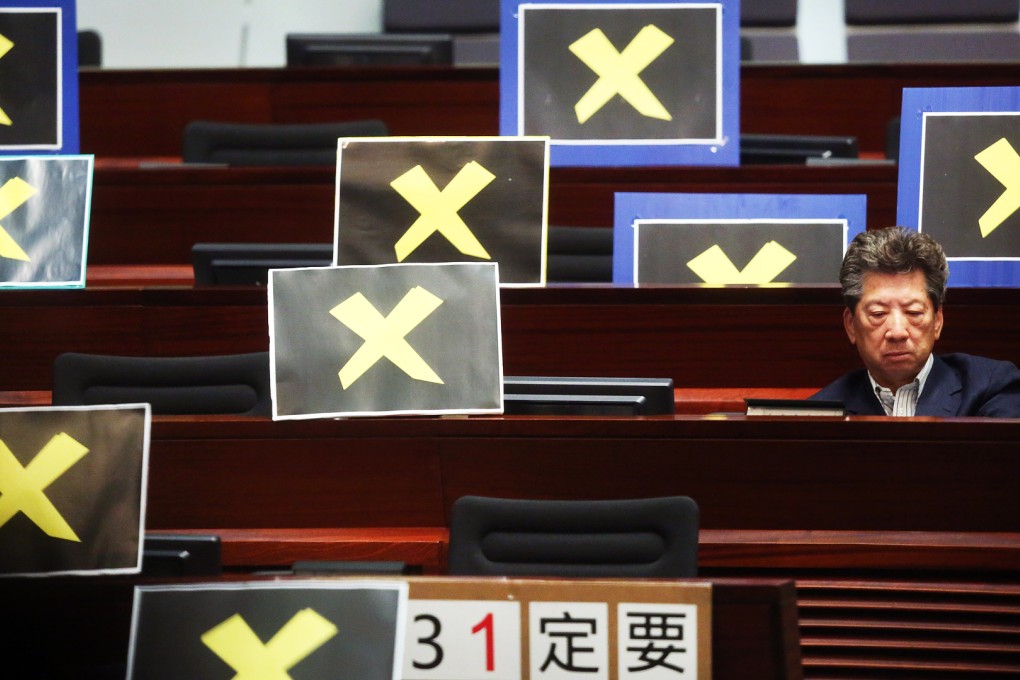Ronny Tong listens to an April speech by Chief Secretary Carrie Lam on political reform in Legco, which prompted other pan-democrats to leave the chamber. Photo: Sam Tsang