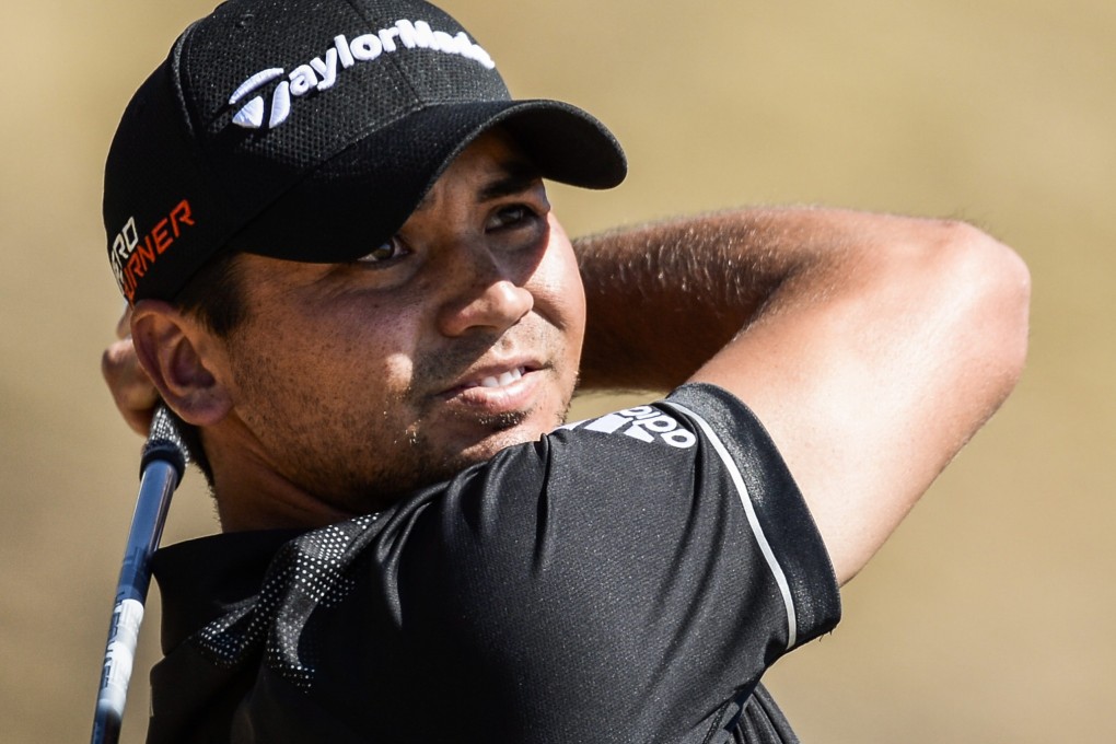 Jason Day won over the crowd after refusing to give up despite vertigo. Photo: EPA