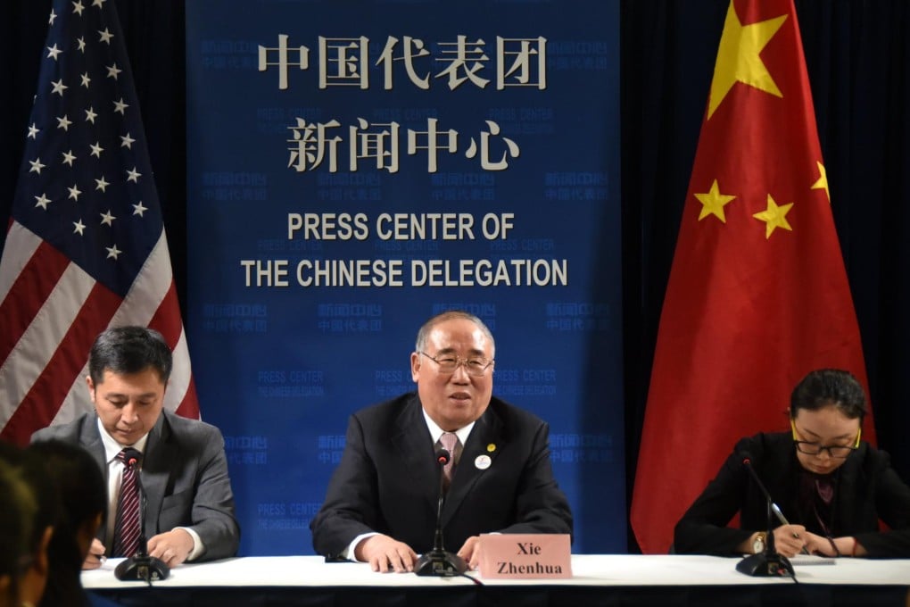Xie Zhenhua, the NDRC's special representative for climate change, speaks in Washington on Tuesday.Photo: CNS